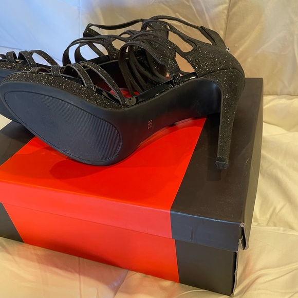 Guess Girlie strapy heels 4.5” black with silver glitter heel zipper. - Picture 6 of 8